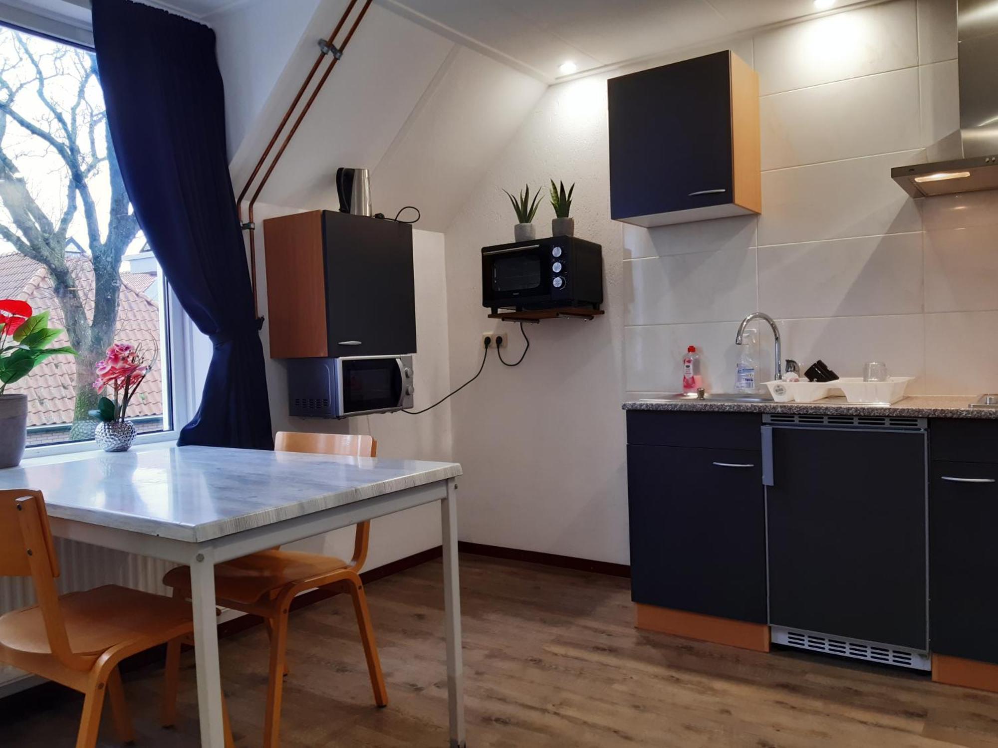Pension Het Hoefijzer Бюрен Экстерьер фото